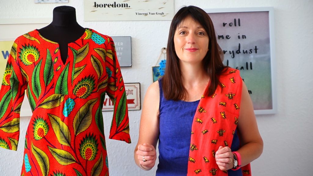 Jo Salter, founder of Where Does It Come From? with a prototype of the new tunics