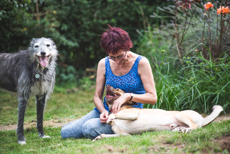 Lisa Tenzin-Dolma, founder and director of the ISCP, with two of her dogs